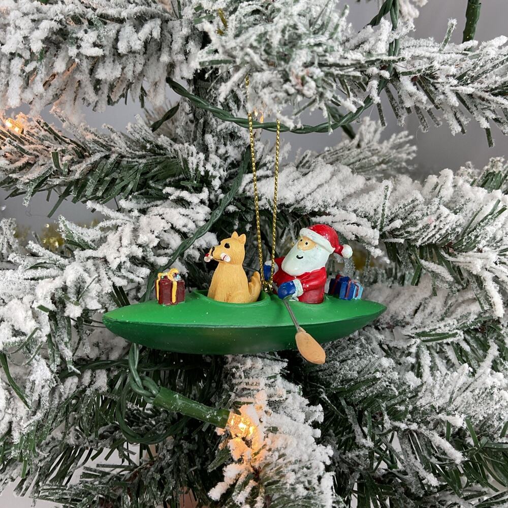 Christmas Ornament- Santa And Dog In A Green Canoe With Presents -Cape Shore